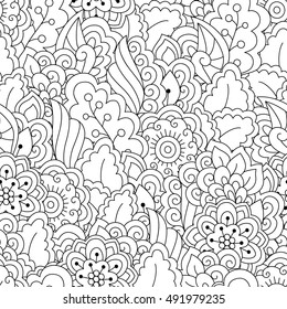 Seamless black and white background. Floral, ethnic, hand drawn elements for design. Good for coloring book for adults or design of wrapping and textile.