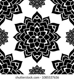Seamless black and white background with flower mandala pattern