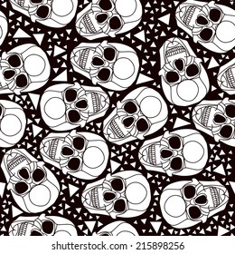Seamless black and white background with skulls