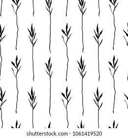 Seamless black and white boho floral pattern. Repeating texture on a white background. Perfect for printing on fabric or paper. Shabby hand drawn blade of grass. Vector ornament