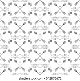 Seamless black and white boho texture of arrows and feathers. Vector element for cards, wallpaper, wrapping paper and your creativity