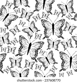 Seamless black and white butterflies background