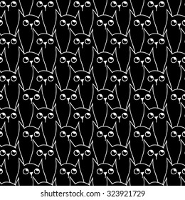 Seamless black and white decorative background with cats