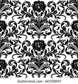 Seamless black and white floral wallpaper pattern.
