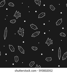 Seamless black and white geometric vector pattern with low-poly crystals.