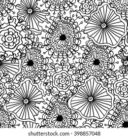 Seamless black and white hand-drawn pattern with flowers. Ornate zentangle texture with abstract flowers. Seamless pattern,abstract illustrtion. Made by trace from sketch. Ink pen. Adult coloring book