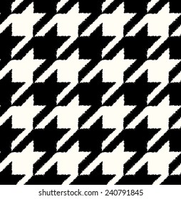 seamless black and white houndstooth checkered background