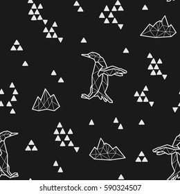 Seamless black and white kids tribal vector pattern with penguins and triangles.