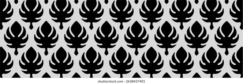 Seamless black and white leaf motif with symmetrical floral shapes, ideal for textile or wallpaper design.