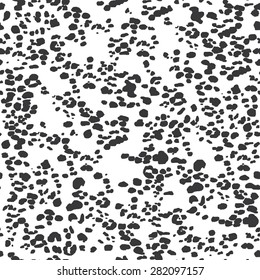 Seamless black and white leopard spots pattern vector
