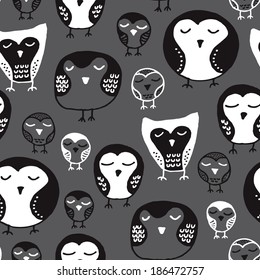 Seamless black and white owl illustration background pattern in vector