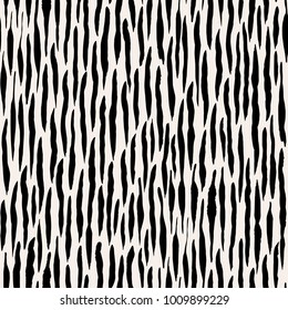 The seamless black and white pattern with abstract brush lines. The creative monochrome hand drawn background for your design. Textile, blog decoration, banner, poster, wrapping paper.