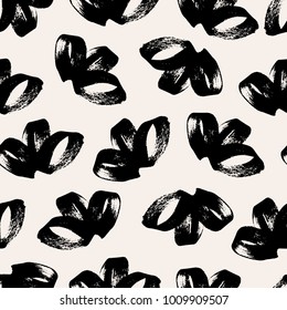 The seamless black and white pattern with abstract textured brush stokes. The creative monochrome hand drawn background for your design. Textile, blog decoration, banner, poster, wrapping paper.