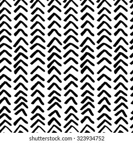 The seamless black and white pattern with brush strokes. The creative monochrome hand drawn background for your design. Textile, blog decoration, banner, poster, wrapping paper.