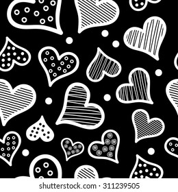 Seamless black and white pattern with decorative hearts