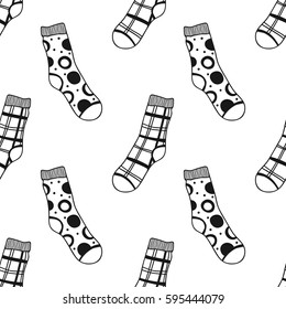 Seamless black, white pattern of doddle socks for coloring book