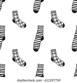 Seamless black, white pattern of doddle socks for colored book