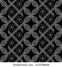 Seamless black and white pattern of dotted intersected flowers and leaves. Floral trellis. Mosaic lattice. Monochrome print of beads. Vector Illustration.