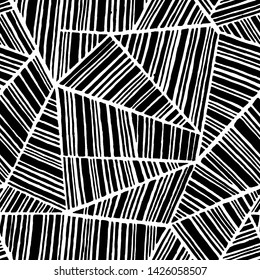 Seamless black and white pattern. Drawn by ink on paper. Handwork. Ethnic and tribal motifs. Patchwork wallpaper. Vector illustration.