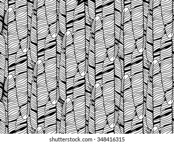 Seamless black and white pattern with feathers 