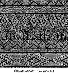 Seamless black and white pattern. Geometrical abstraction. Ethnic and tribal motifs. Striped print for textiles. Vector illustration hand-drawn.