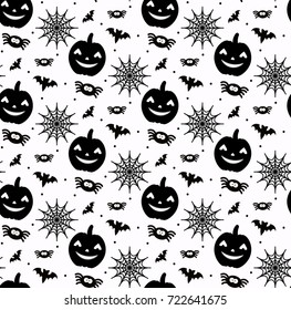 Seamless black and white  pattern with Halloween symbols such as pumpkin, spiders, nets, bats and autumn leaves. Vector illustration. 
