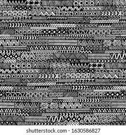 Seamless black and white pattern. Hand-drawn ornament in patchwork style. Ethnic and tribal motifs. Vector illustration.