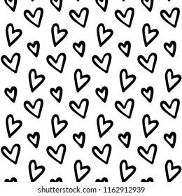 Seamless black and white pattern of hearts.