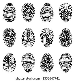 Seamless black and white pattern. On a white background are Easter eggs painted with black lines. Vector illustration.