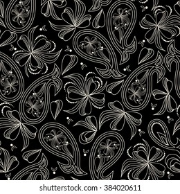 Seamless black and white pattern with paisley and flowers. Traditional ornamental ethnic  pattern. Vector background.