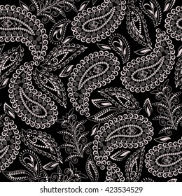 Seamless black and white pattern with paisley and flowers. Traditional ethnic ornament, vector background.
