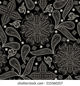 Seamless black and white pattern with paisley and flowers. Traditional ethnic ornament. Vector background.