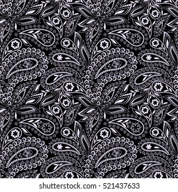Seamless black and white pattern with paisley and flowers. Traditional ethnic ornament - vector print.