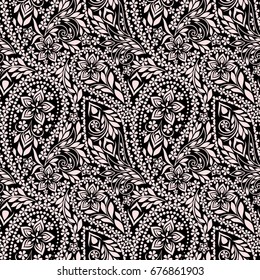 Seamless black and white pattern with paisley and flowers. Traditional ethnic ornament, vector background.