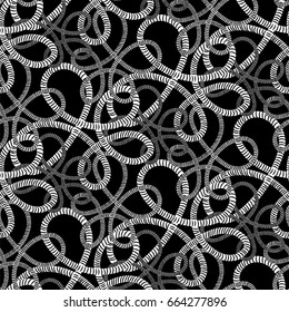Seamless black and white pattern from the rope tangled marine ropes and nautical rope knot