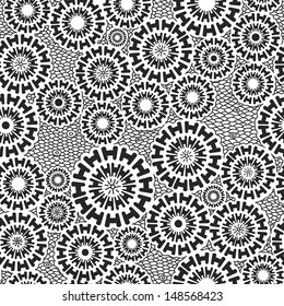 Seamless black and white pattern with rotated elements