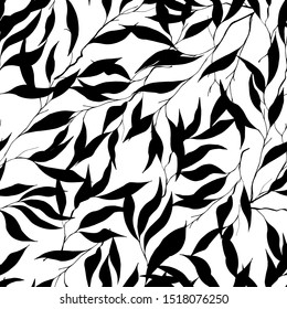 Seamless black and white pattern. Silhouettes of leaves on a white background. Textile endless ornament.