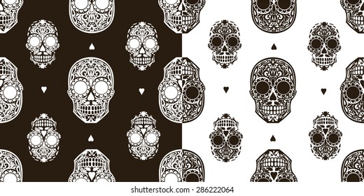 Seamless black and white pattern of skulls. Mexican motifs pattern. Patterned skull textile pattern.