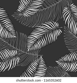 Seamless black and white pattern with tropical palm leaves. Vector illustration in sketch style.