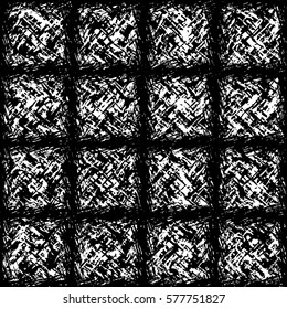 seamless black and white texture in the form of stitched squares of coarse wool
