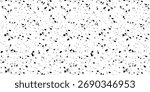 A seamless black and white texture pattern resembling terrazzo flooring or abstract scattered ink spots.