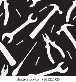 Seamless black and white texture with silhouettes of working tools. Vector pattern for your creativity
