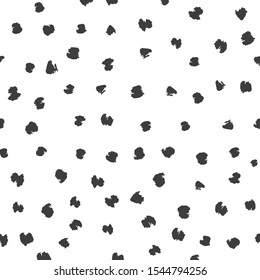 Seamless black and white vector free hand doodle texture with dots, dry brush ink art.