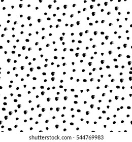 Seamless black and white vector free hand doodle texture with dots, dry brush ink art.