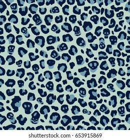 Seamless blue animal leopard print with skulls pattern vector