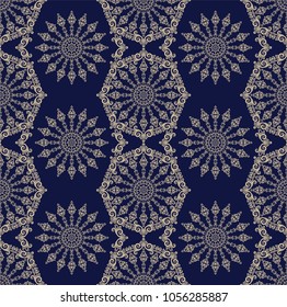 Seamless blue background with beige mandala ornament in the east style. Ideal for printing on fabric or paper. Vector illustration.