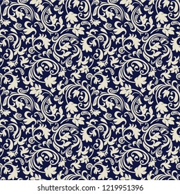 Seamless blue background with beige pattern in baroque style. Vector retro illustration. Ideal for printing on fabric or paper for wallpapers, textile, wrapping. 