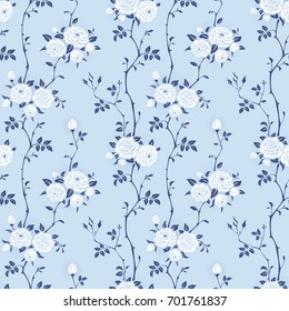 Seamless blue background with branches of roses. Floral pattern for wallpaper, fabric, digital paper, fills, etc. Shabby chic style.