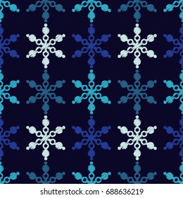 Seamless blue background with decorative snowflakes. Scribble texture. Textile rapport.
