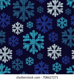 Seamless blue background with decorative snowflakes. Scribble texture. Textile rapport.